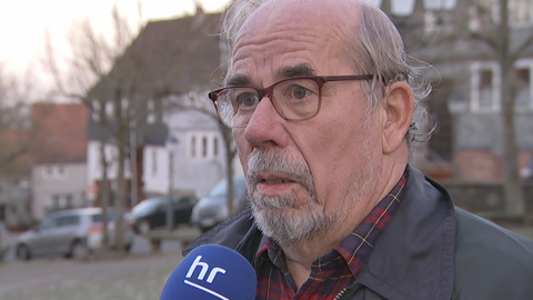 Mann mit hr-Mikrofon