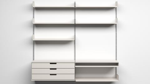 Ein Regalsystem mit Regalbrettern und Schubladenelementen aus weißem Metall