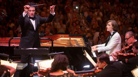 Yoav Levanon on the piano - conductor Alain Altinoglu next to him