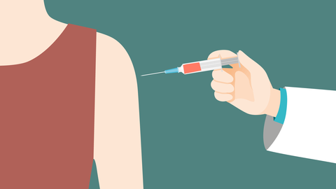Die Grafik zeigt den Oberarm eines Menschen und eine Hand, die eine Impfspritze zu diesem Oberarm führt.