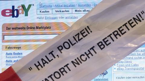 "Tatort nicht betreten!" Absperrband vor ebay-Bildschirm