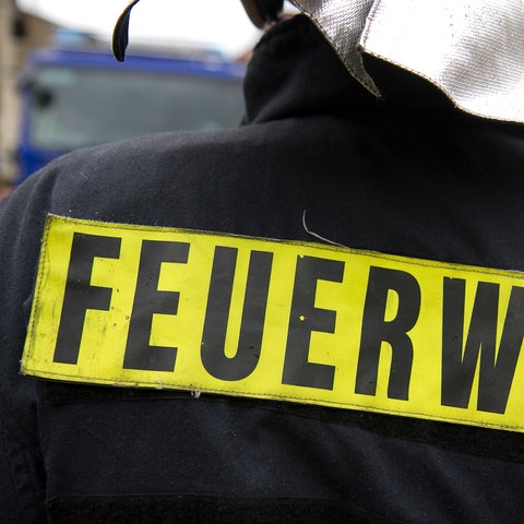 Feuerwehrjacke mit Aufschrift