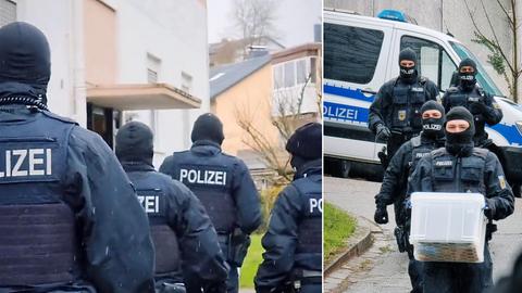 Vermummte Polizeieinsatzkräfte im Einsatz