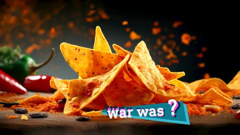 Fotografisches Stilleben: Tortillachips liegen auf einem kleinen Häufchen auf einem Tisch, umgeben von Chilischoten und Gewürzpulver. Auf dem Bild eine kleine, farbige Grafik mit dem Schriftzug "war was?".