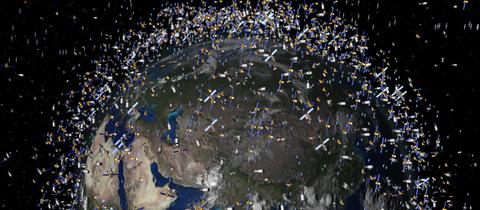 Die Erde in einer Wolke aus Satelliten