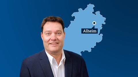 Karte von Hessen mit dem Ort Alheim, daneben Portrait Jochen Schmidt.