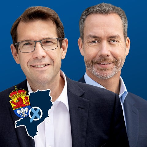 Darmstädter OB-Kandidaten Kolmer und Benz vor blauem Hintergrund