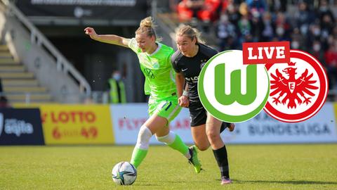 Spielerinnen von Wolfsburg und der Eintracht im Duell