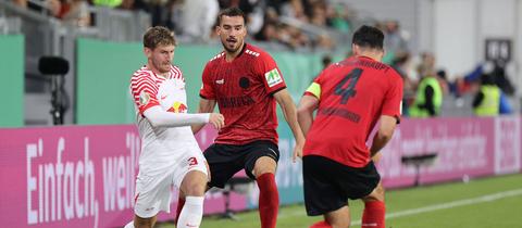 Ivan Prtajin und Sascha Mockenhaupt im Pokalspiel gegen Leipzig