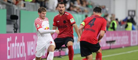 Ivan Prtajin und Sascha Mockenhaupt im Pokalspiel gegen Leipzig