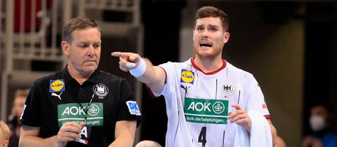 Johannes Golla (li.) mit Bundestrainer Alfred Gislason