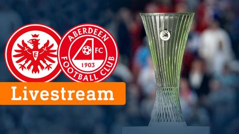 Auf einem Foto von einem Pokal ist eine orangfarbene Fläche zu sehen, auf welcher "Livestream" steht. Darüber sind zwei Logos von den Fußballvereinen Eintracht Frankfurt und Abderdeen zu sehen.