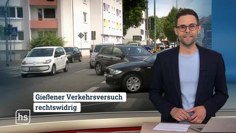 Moderator vor Bild mit Topthema