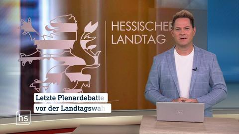 Moderator vor Bild von Topthema