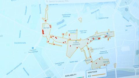 Digitale Karte der Frankfurter Innenstadt mit einer gelb-markierten Sperrzone und vielen roten Punkten