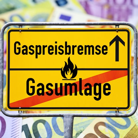 Schild mit Aufschrift "Gaspreisbremse"