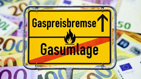 Schild mit Aufschrift "Gaspreisbremse"