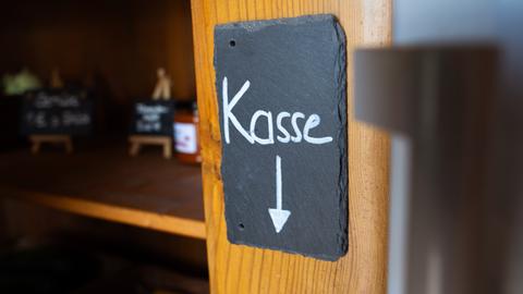 Kasse Schild Sujet