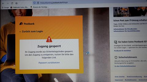 Der Bildschirm zeigt: Postbank - Zugang gesperrt