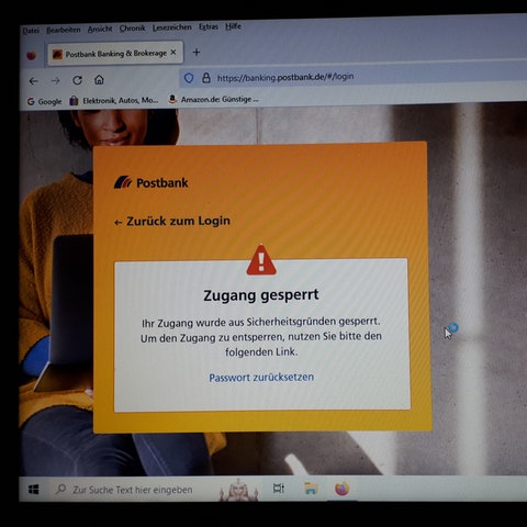 Der Bildschirm zeigt: Postbank - Zugang gesperrt